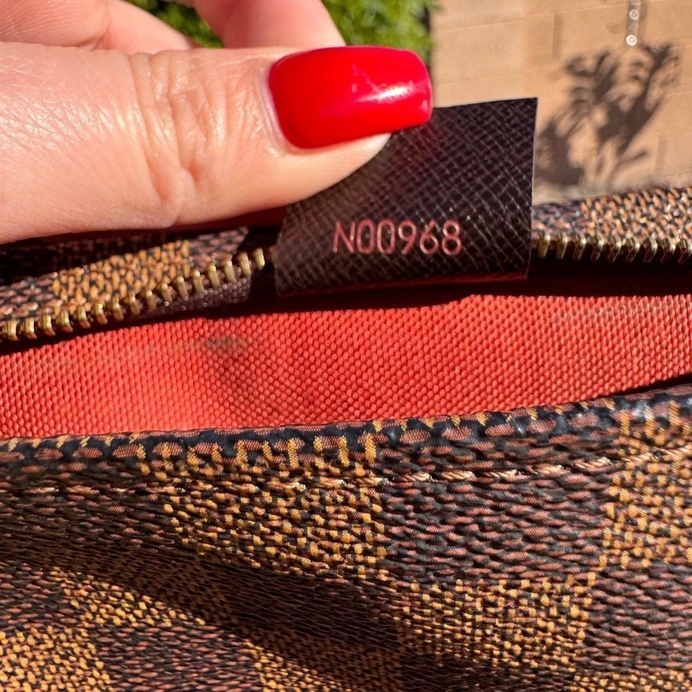 Authentic Louis Vuitton Damier Ebene Pochette handbag